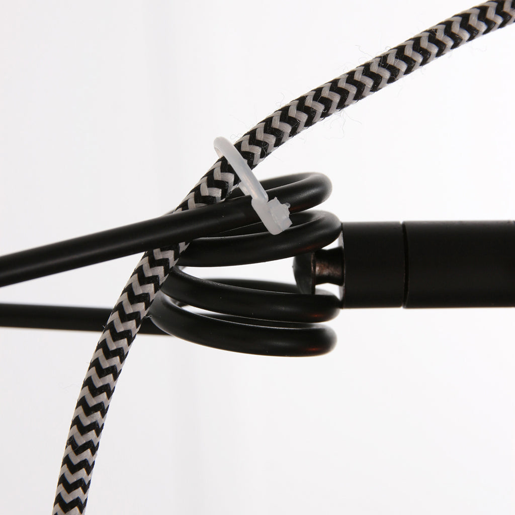Wandleuchte aus schwarzem Metall mit schwenkbarem Arm und goldenen Details – H20 cm