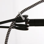 Wandleuchte aus schwarzem Metall mit schwenkbarem Arm und goldenen Details – H20 cm