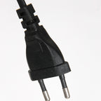 Wandleuchte aus schwarzem Metall mit kabellosem Ladepad und USB-Anschlüssen