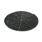 Runder Glasuntersetzer aus schwarzen Perlen mit Spiralmuster