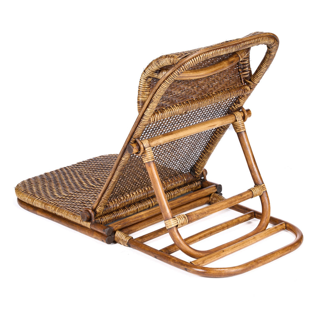 Fauteuil bas pliant en rotin finition miel avec dossier réglable