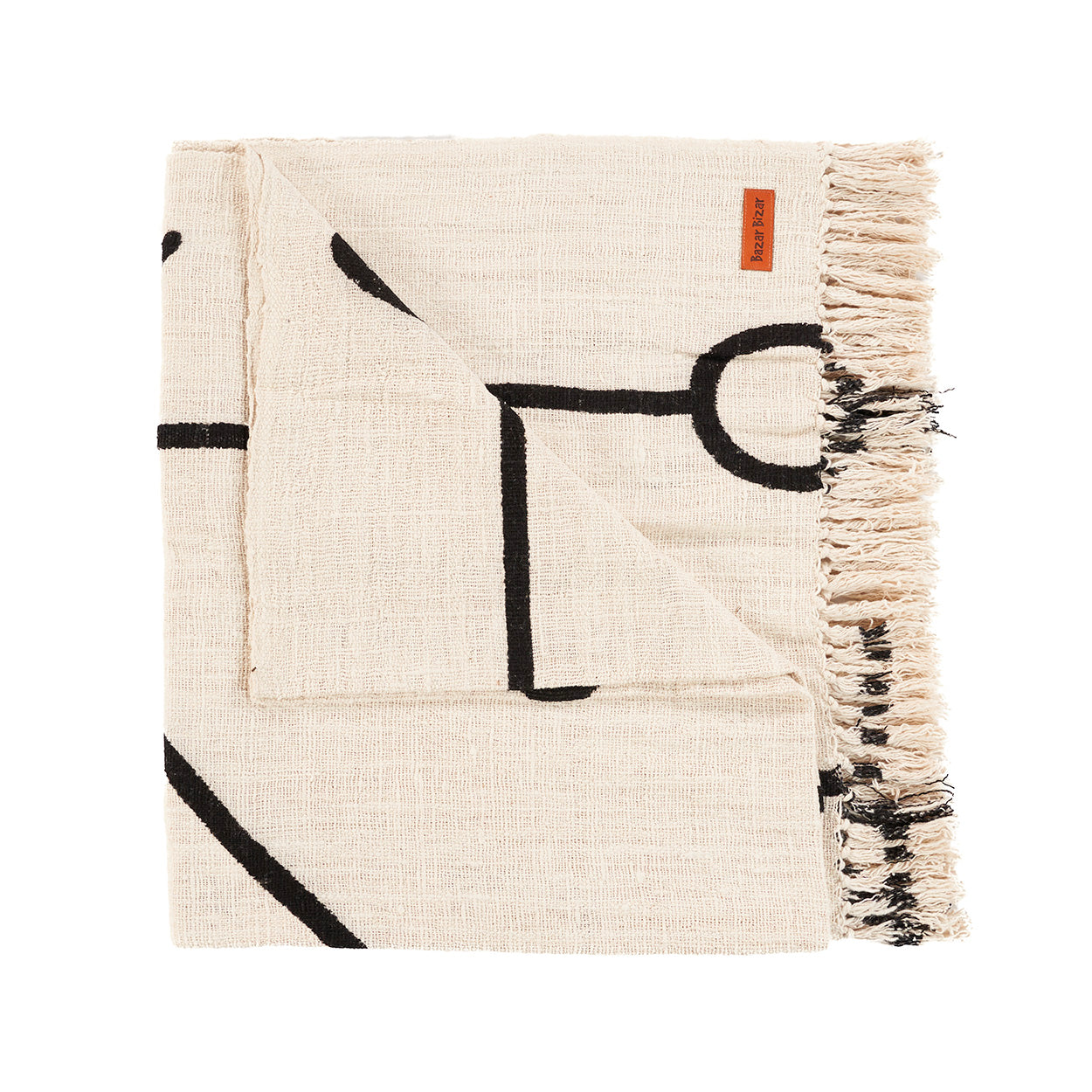 Tagesdecke aus Baumwolle in Schwarz-Natur mit Schutzauge-Motiv und Fransen
