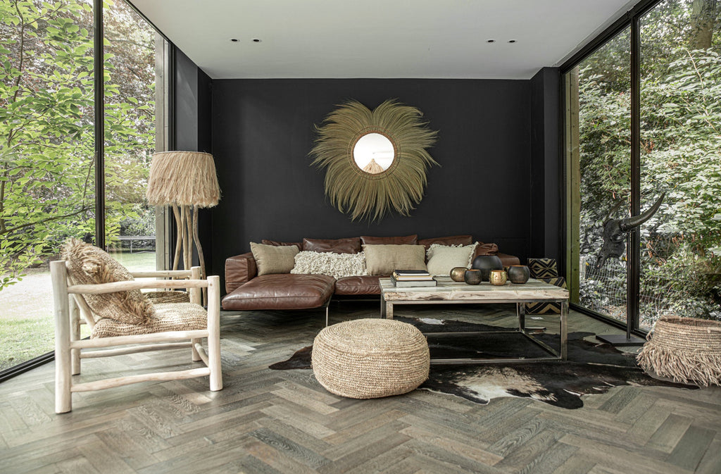 Windlicht aus Metall in Schwarz und Gold, durchbrochene Kugel