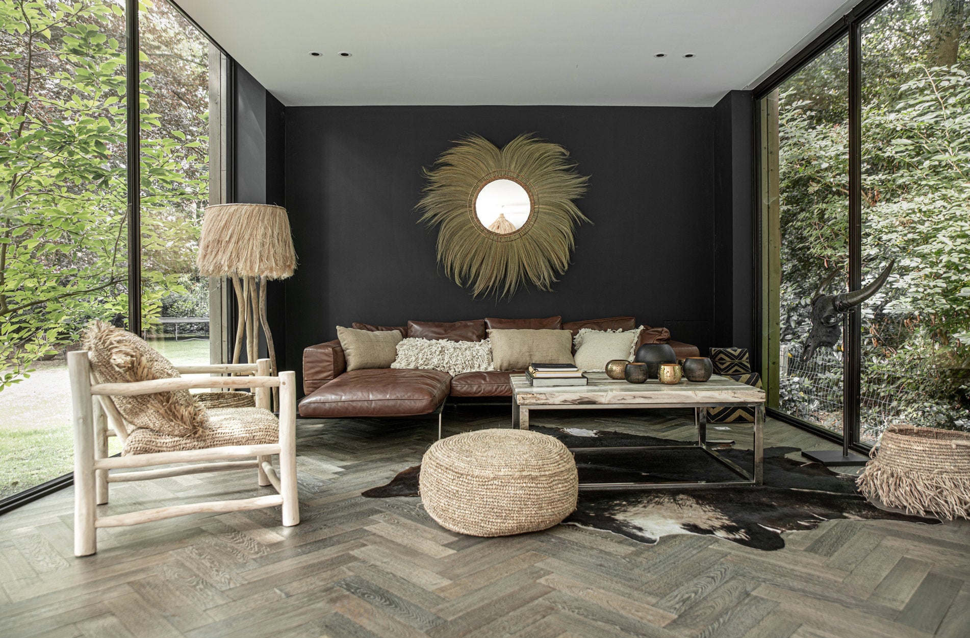Windlicht aus Metall in Schwarz und Gold, durchbrochene Kugel