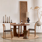 Table ronde en bois massif brun pied sculptural croisé – Ø120 cm