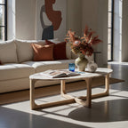 Ovaler Couchtisch aus Marmor in Creme und Holz – 120x60 cm