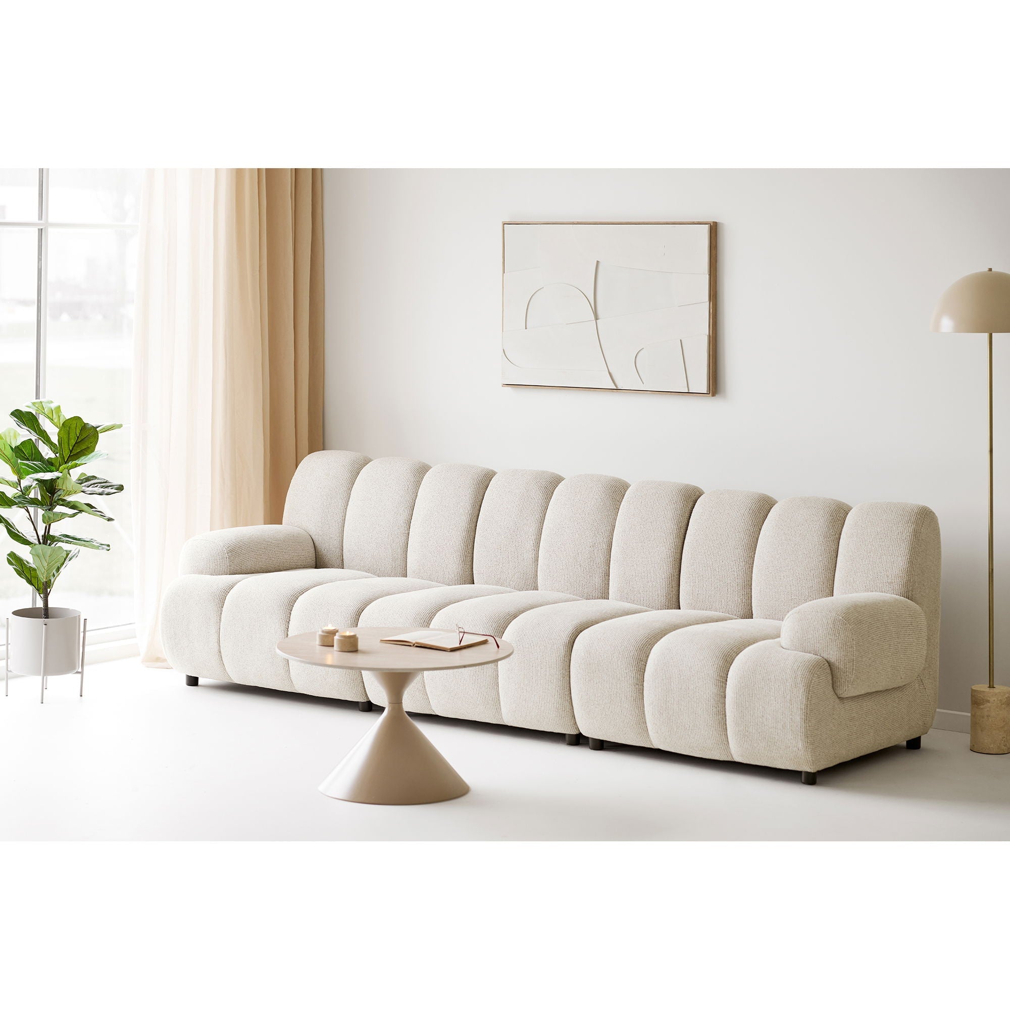 Canapé modulaire crème en peluche avec coussins ronds segmentés