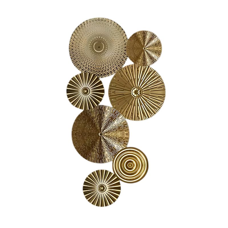 Runde Wanddeko aus Metall in Gold