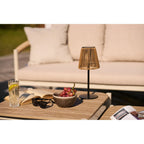 Lampe à poser en rotin ajouré et métal noir, H30 cm