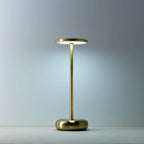 Lampe de table minimaliste en métal laiton, tête disque, base galet, H27 cm