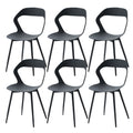 Ensemble de 6 chaises contemporaines noires avec pieds en métal, photographiées sur fond blanc.