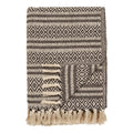 Couverture en coton recyclé beige et noir à motifs losanges avec franges