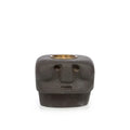 Porte-bougie en grès noir sculpté visage stylisé avec insert en laiton