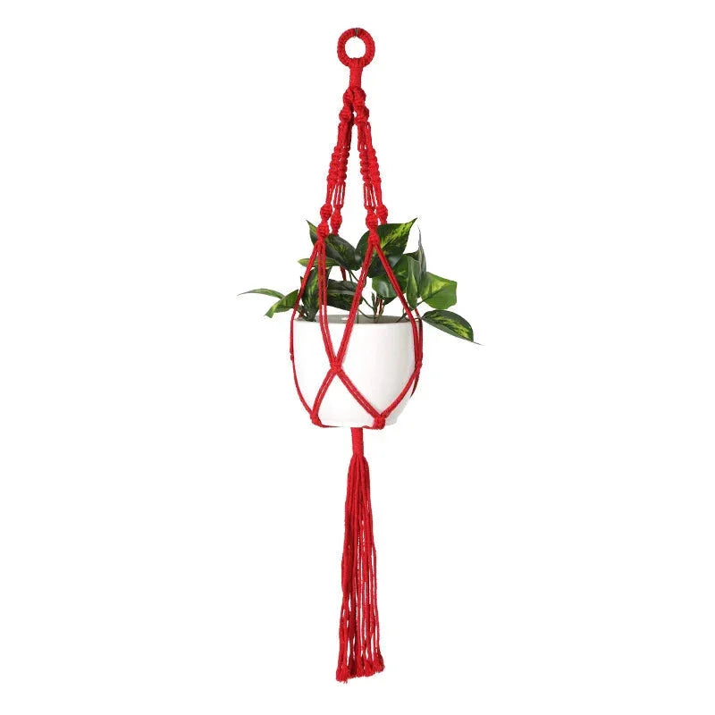 Blumenampel aus rotem Makramee mit langen Fransen, zylindrisch