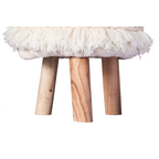 Ottoman rond crème en laine tissée avec franges et pieds en bois naturel H50 cm
