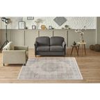 Tapis oriental rectangulaire en tissu gris avec motif central et design faded